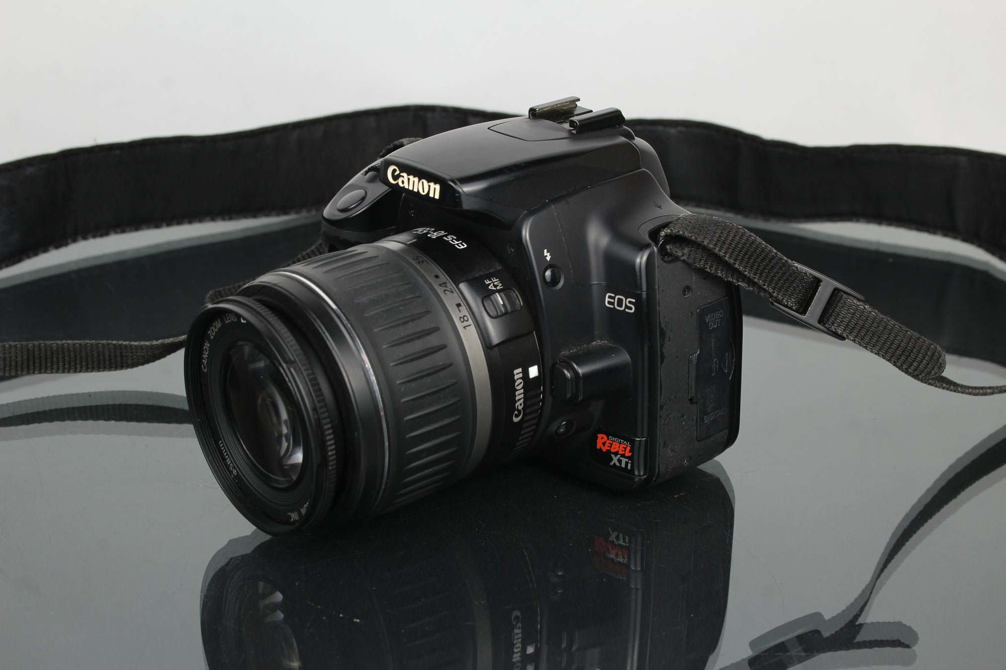 Canon EOS Rebel XTI + 18-55mm 1:3.5-5.6 Canon EF-S lens